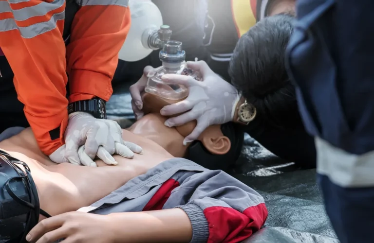 Occupational first aid instructor in Surrey discussing OFA Level 2 training options
