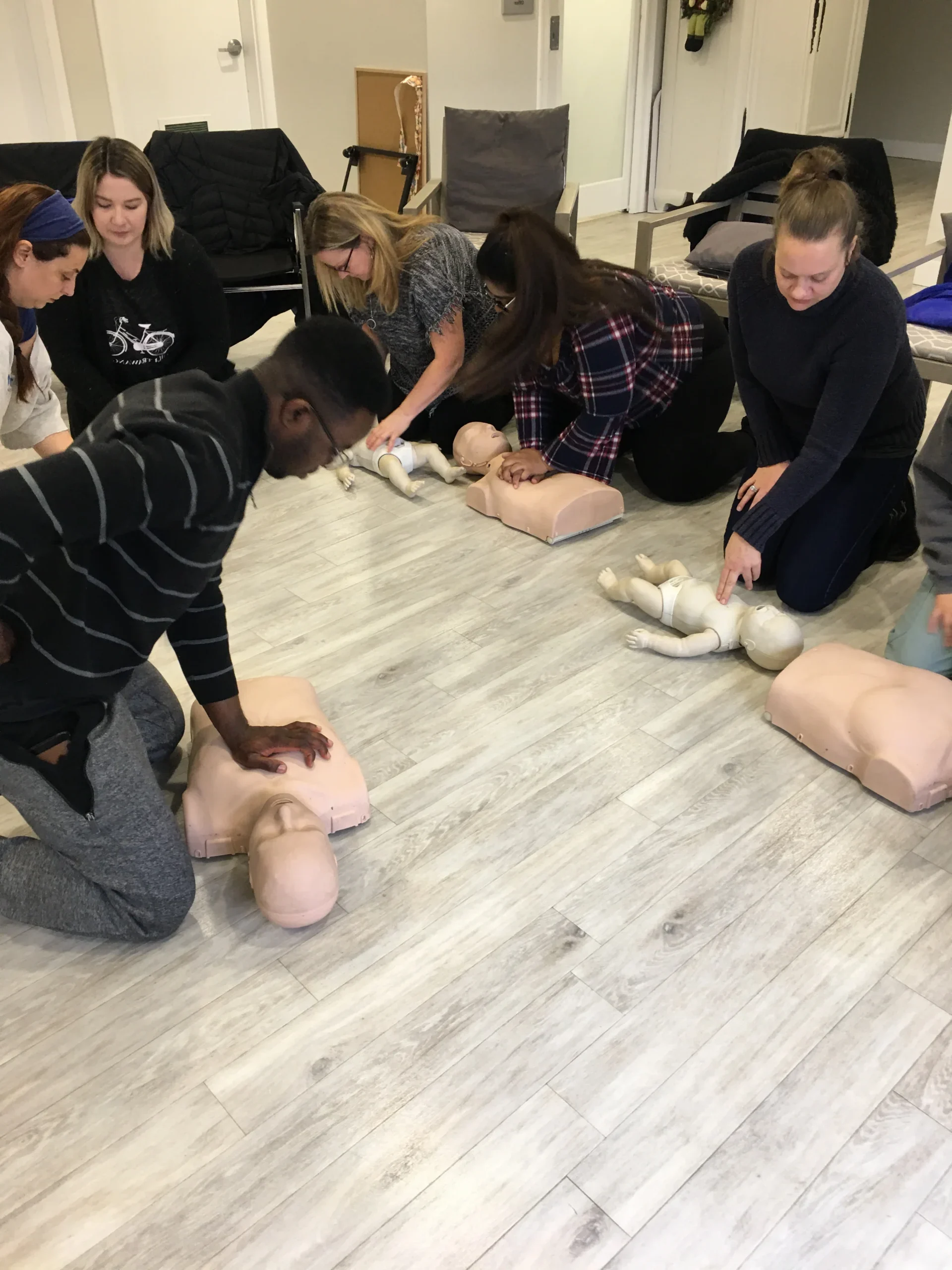 Standard First Aid certification materials and practical training setup in British Columbia