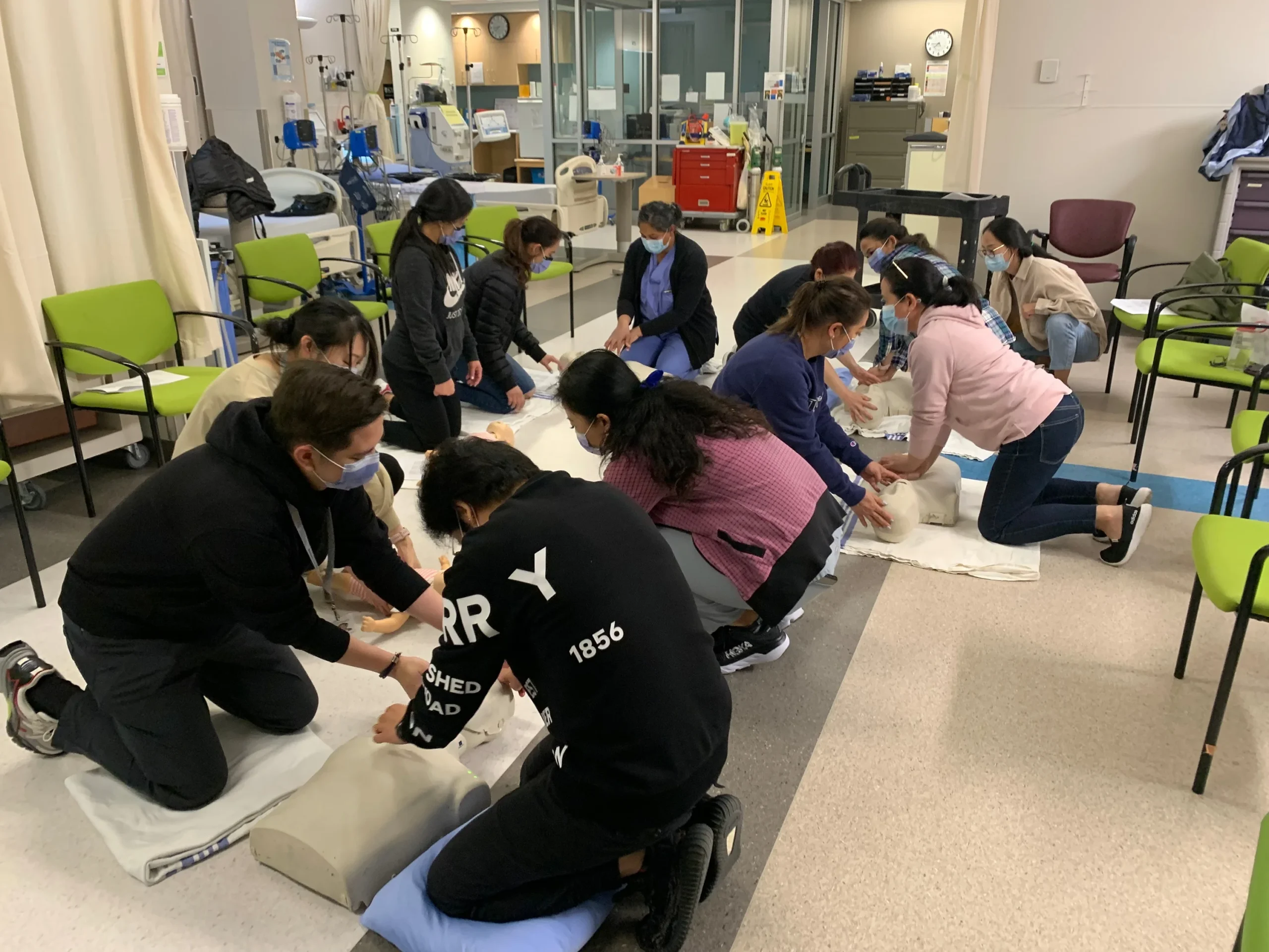 First aid training participant reviewing certification and safety materials in Surrey