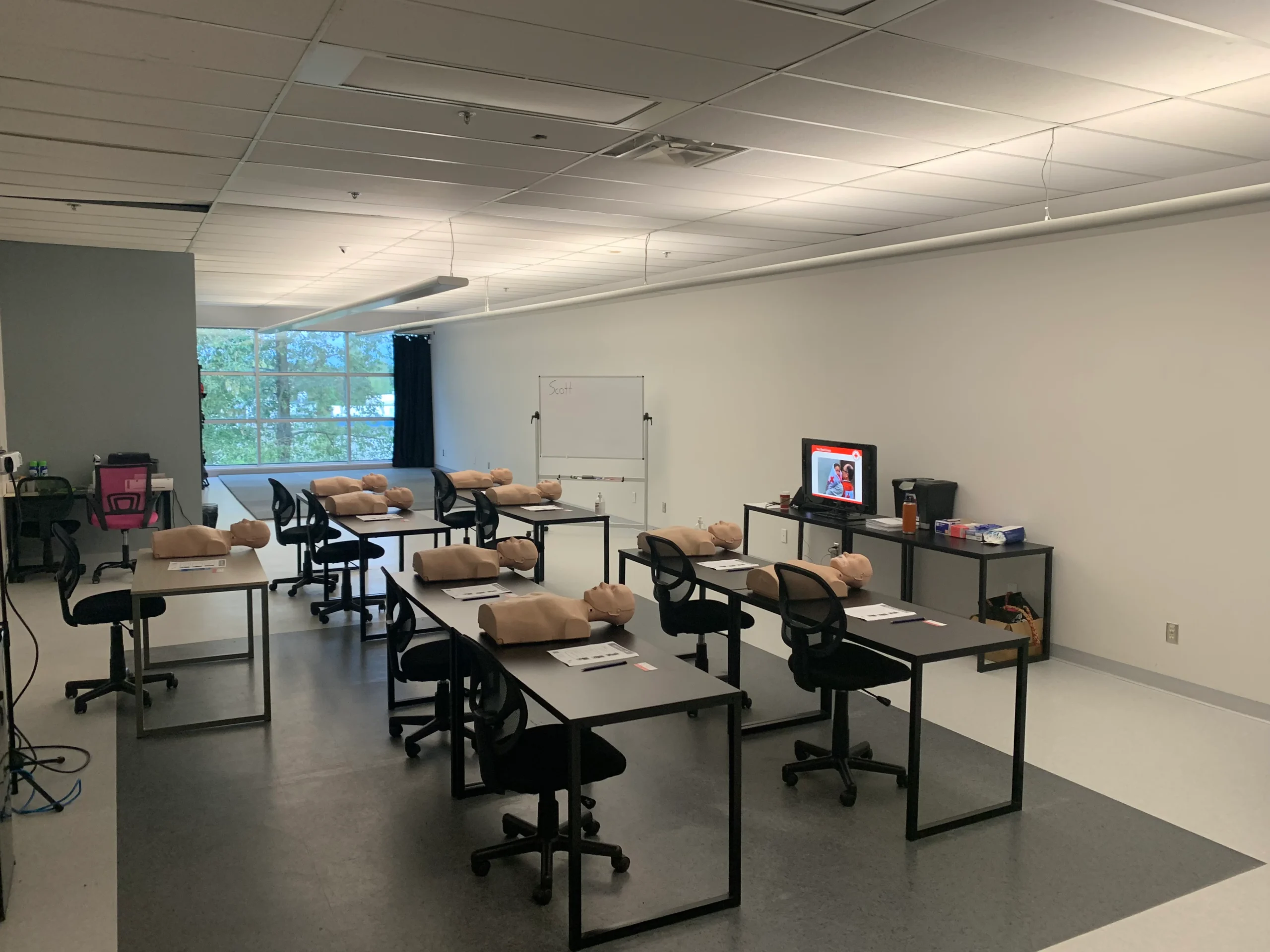 Standard First Aid certification materials and practical training setup in British Columbia